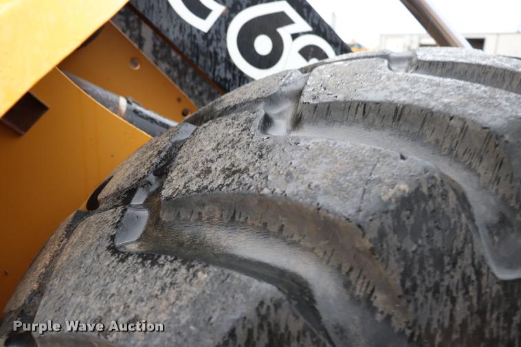 image for item DK9535 2000 John Deere TC62H wheel loader