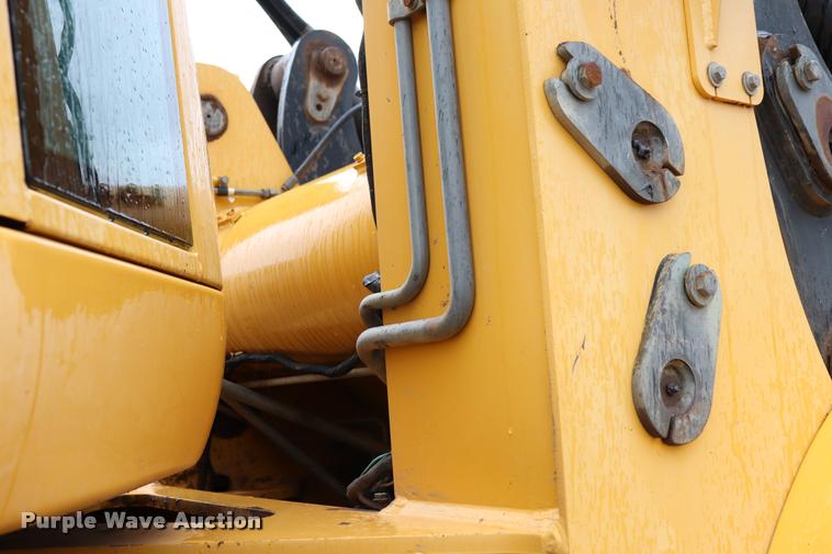 image for item DK9535 2000 John Deere TC62H wheel loader