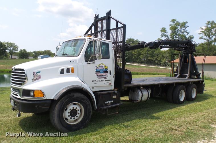 image for item K1846 2003 Sterling L9500 grapple crane truck