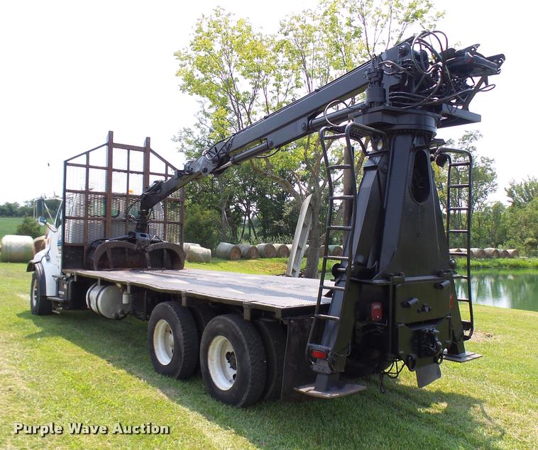image for item K1846 2003 Sterling L9500 grapple crane truck