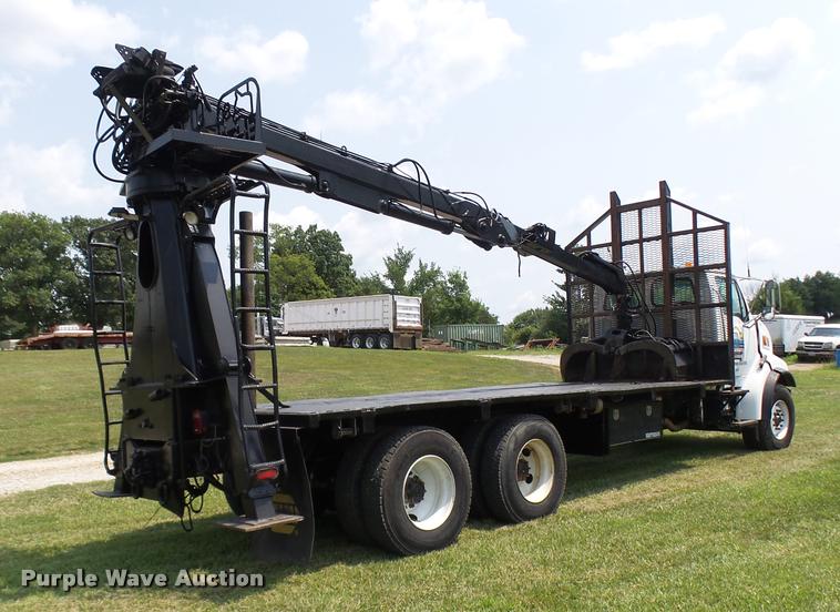 image for item K1846 2003 Sterling L9500 grapple crane truck