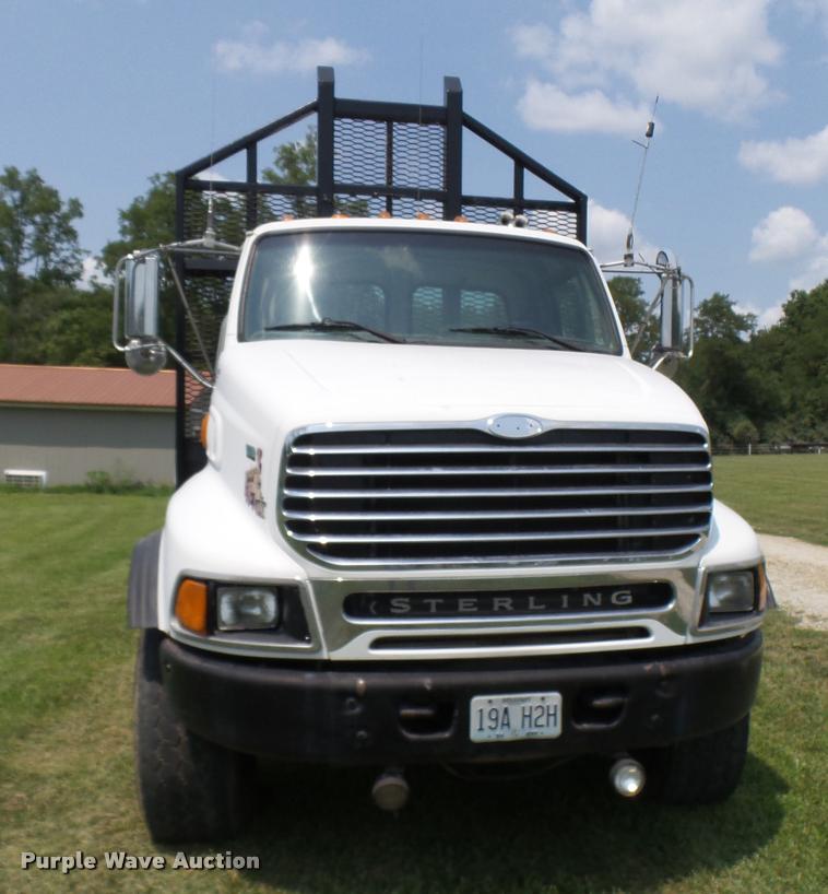 image for item K1846 2003 Sterling L9500 grapple crane truck