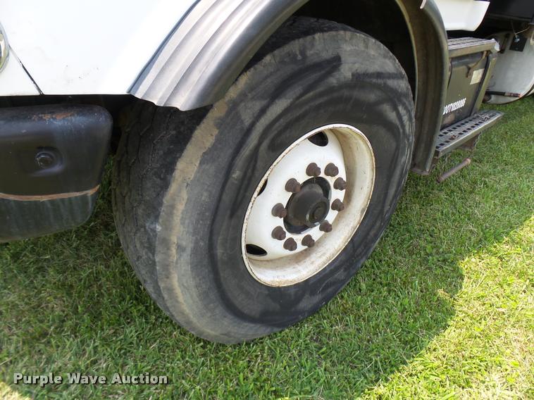 image for item K1846 2003 Sterling L9500 grapple crane truck