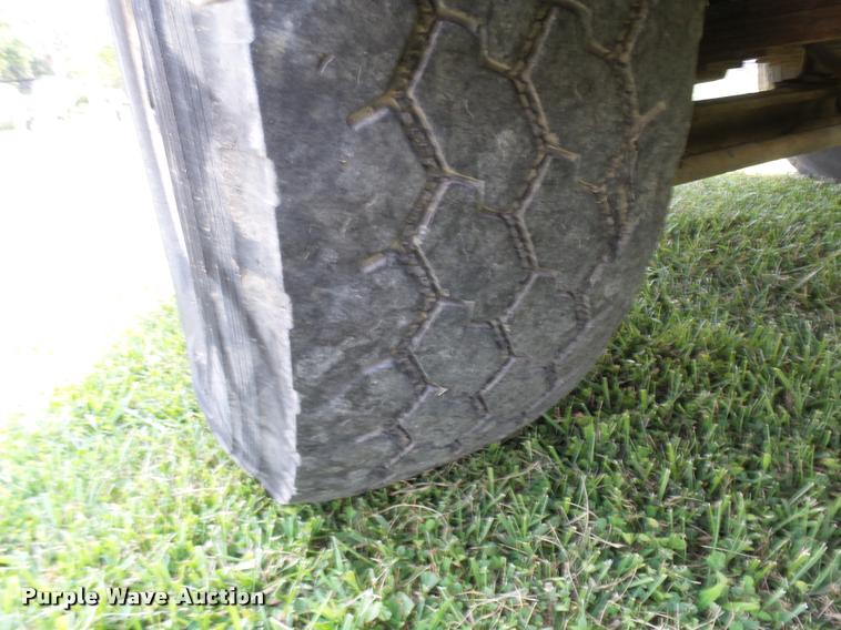 image for item K1846 2003 Sterling L9500 grapple crane truck