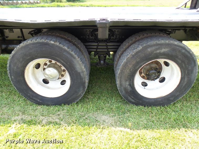 image for item K1846 2003 Sterling L9500 grapple crane truck