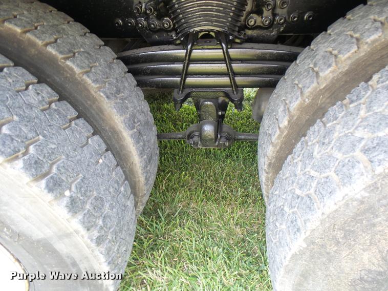 image for item K1846 2003 Sterling L9500 grapple crane truck