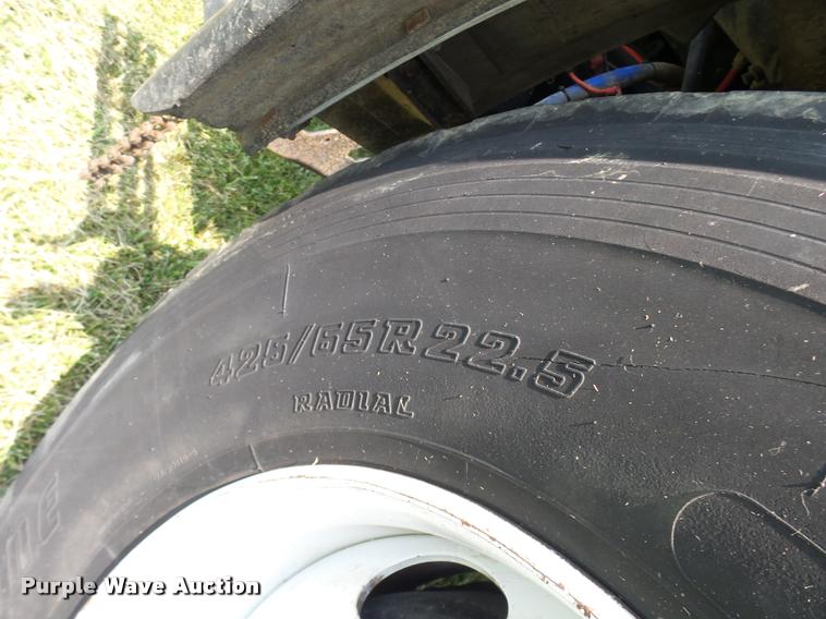 image for item K1846 2003 Sterling L9500 grapple crane truck