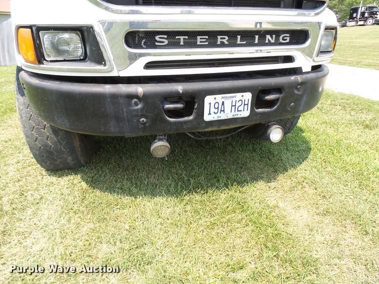 image for item K1846 2003 Sterling L9500 grapple crane truck