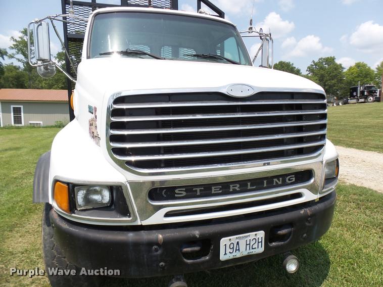 image for item K1846 2003 Sterling L9500 grapple crane truck