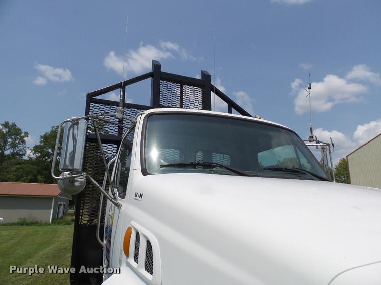 image for item K1846 2003 Sterling L9500 grapple crane truck