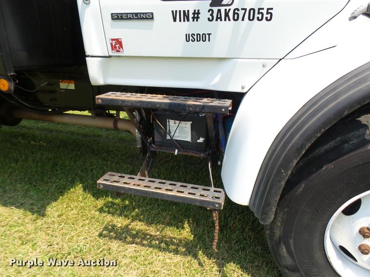 image for item K1846 2003 Sterling L9500 grapple crane truck