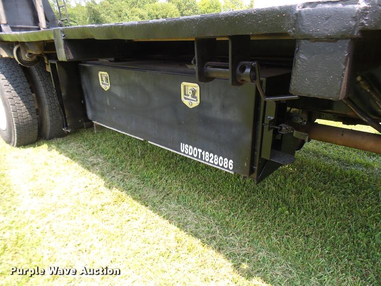 image for item K1846 2003 Sterling L9500 grapple crane truck