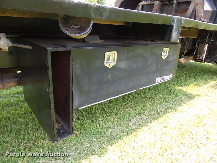 image for item K1846 2003 Sterling L9500 grapple crane truck