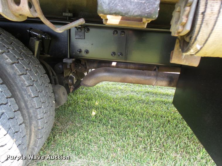 image for item K1846 2003 Sterling L9500 grapple crane truck