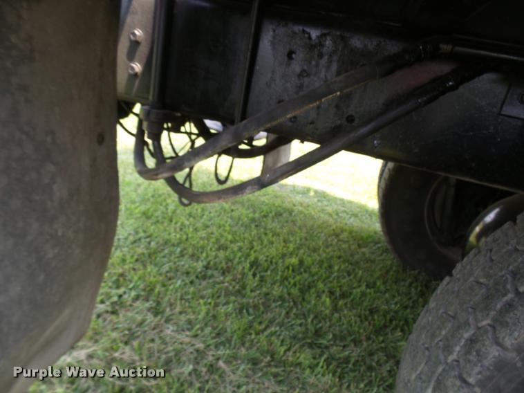 image for item K1846 2003 Sterling L9500 grapple crane truck