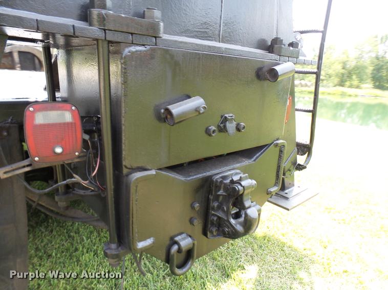 image for item K1846 2003 Sterling L9500 grapple crane truck