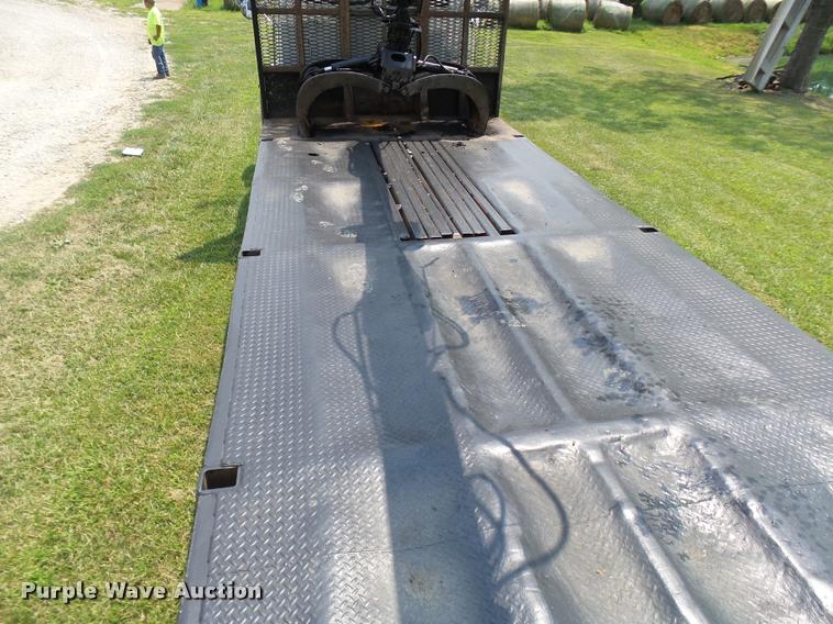 image for item K1846 2003 Sterling L9500 grapple crane truck