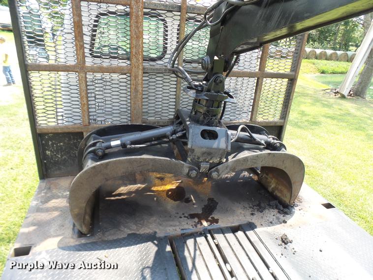 image for item K1846 2003 Sterling L9500 grapple crane truck