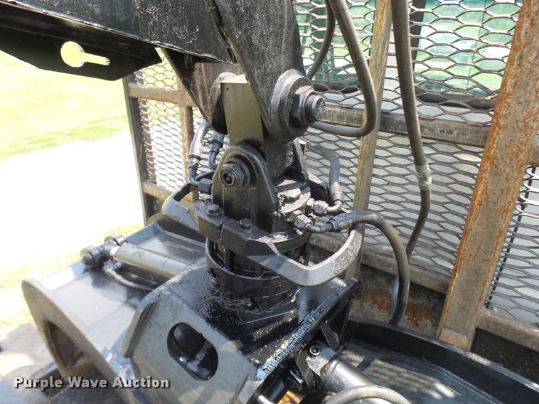 image for item K1846 2003 Sterling L9500 grapple crane truck