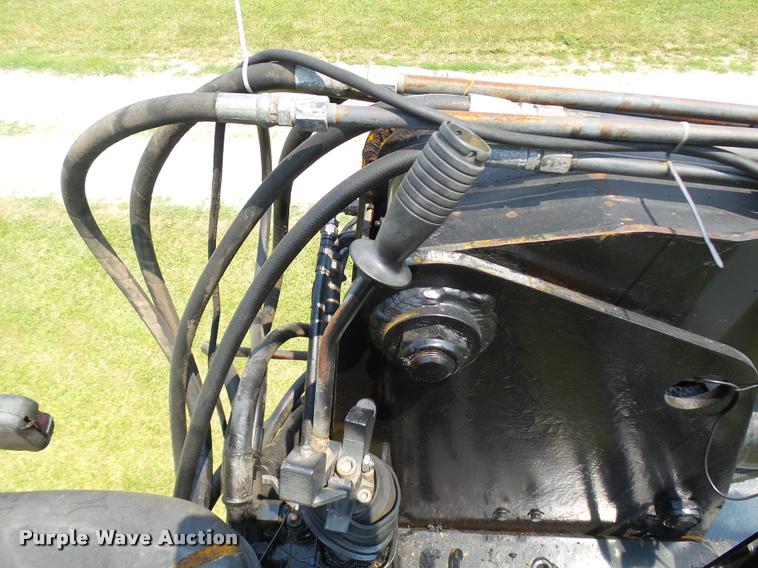 image for item K1846 2003 Sterling L9500 grapple crane truck