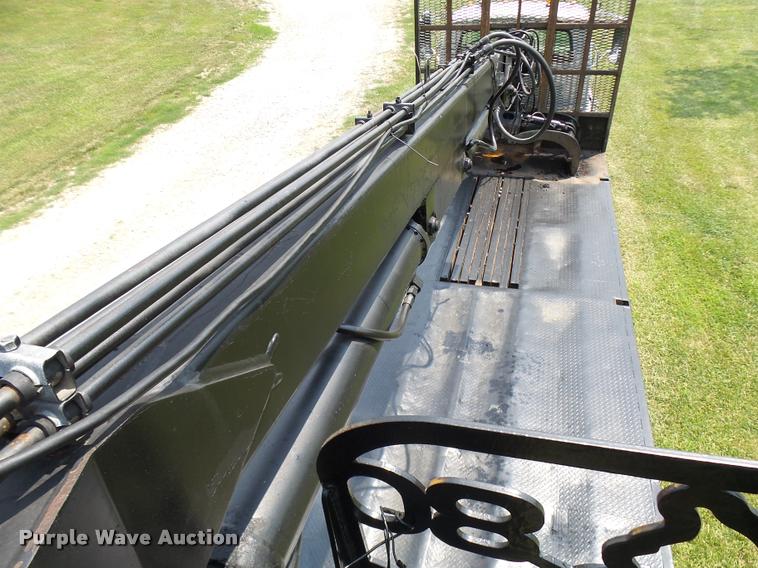 image for item K1846 2003 Sterling L9500 grapple crane truck