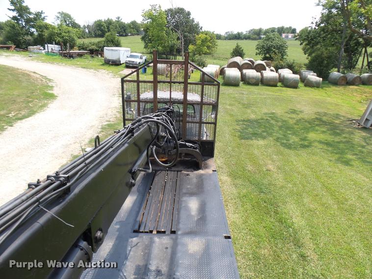 image for item K1846 2003 Sterling L9500 grapple crane truck