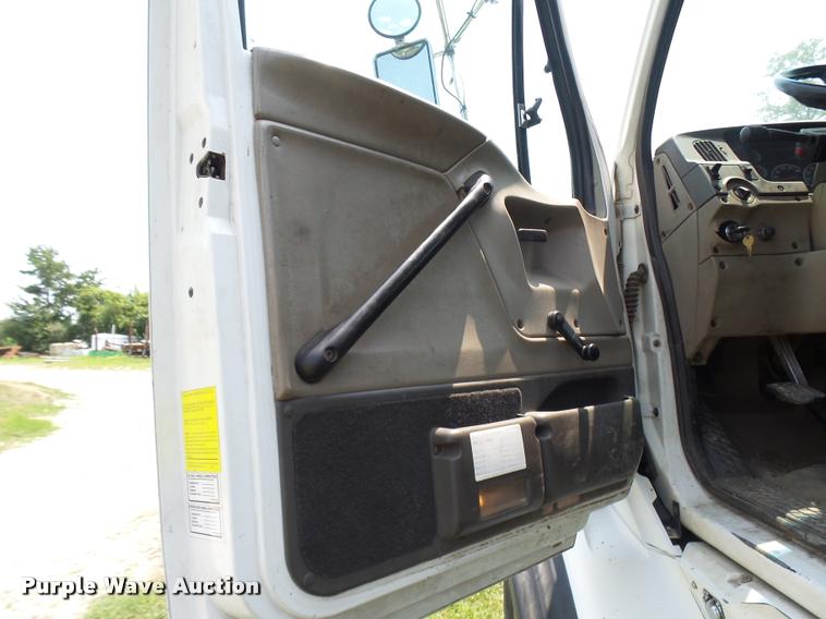 image for item K1846 2003 Sterling L9500 grapple crane truck