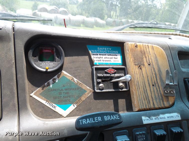 image for item K1846 2003 Sterling L9500 grapple crane truck