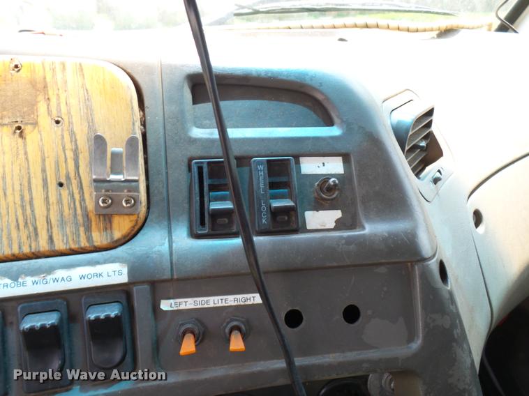 image for item K1846 2003 Sterling L9500 grapple crane truck