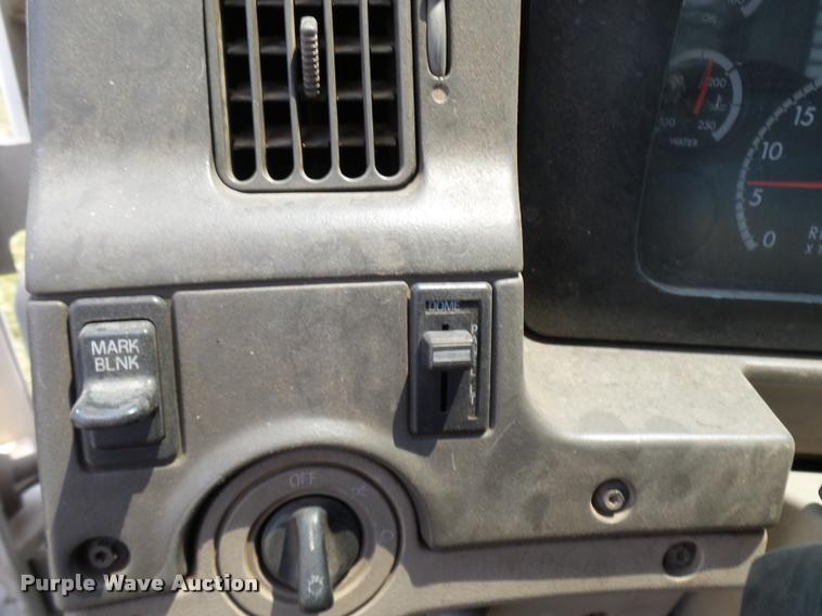 image for item K1846 2003 Sterling L9500 grapple crane truck