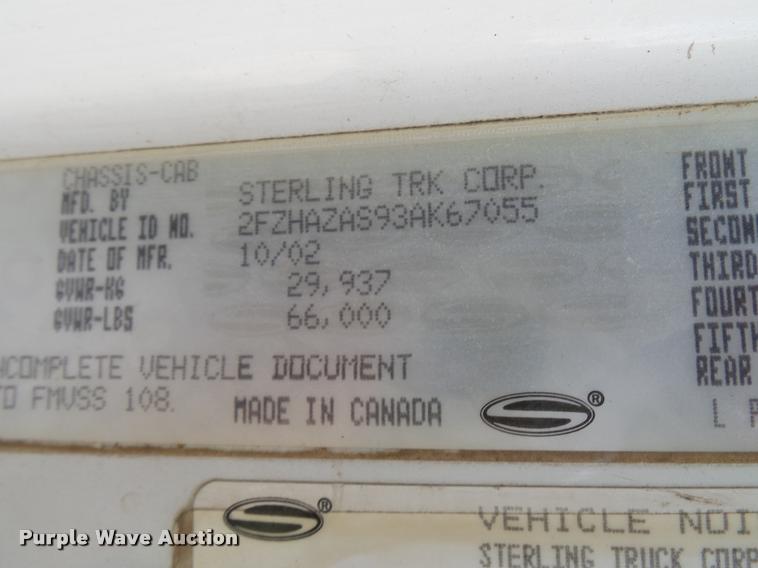 image for item K1846 2003 Sterling L9500 grapple crane truck