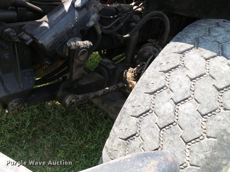 image for item K1846 2003 Sterling L9500 grapple crane truck