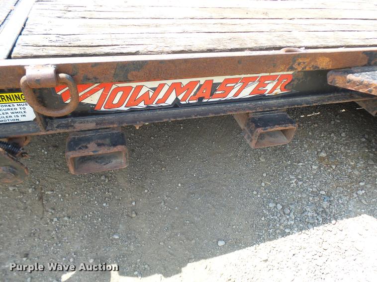 image for item K1872 2002 Towmaster T-12-T tilt deck equipment trailer