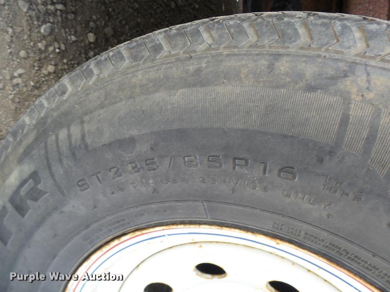 image for item K1872 2002 Towmaster T-12-T tilt deck equipment trailer