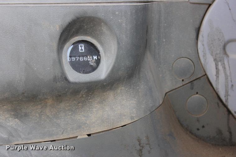image for item L3207 2000 John Deere 120 excavator