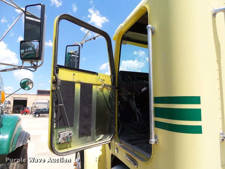 image for item DB4075 2009 Freightliner FLD120 SD semi truck