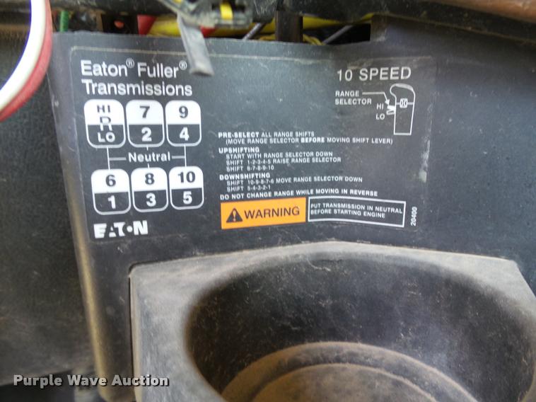 image for item DB4075 2009 Freightliner FLD120 SD semi truck