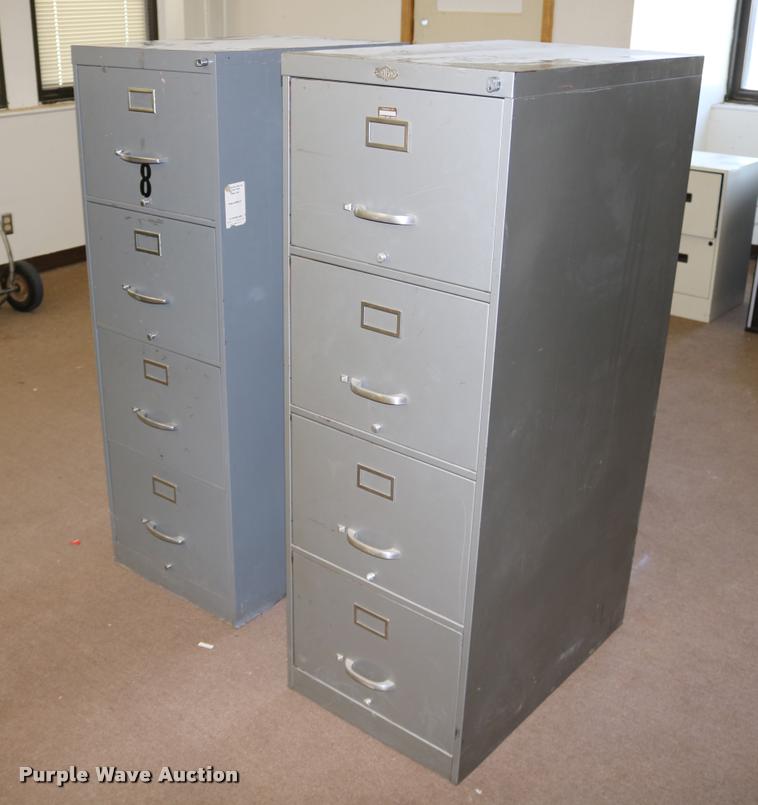 image for item DM9356 (2) four drawer filing cabinets