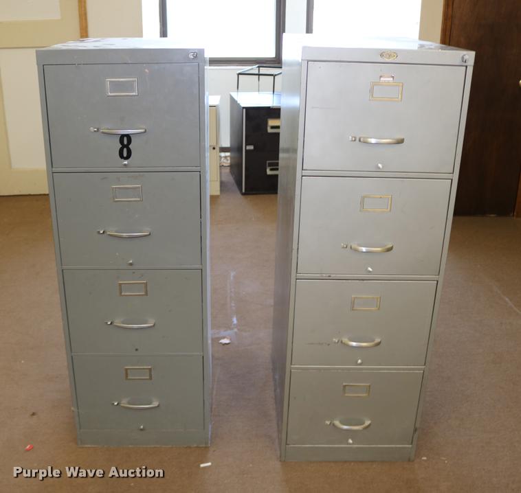 image for item DM9356 (2) four drawer filing cabinets