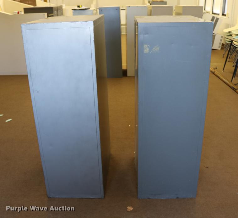 image for item DM9356 (2) four drawer filing cabinets