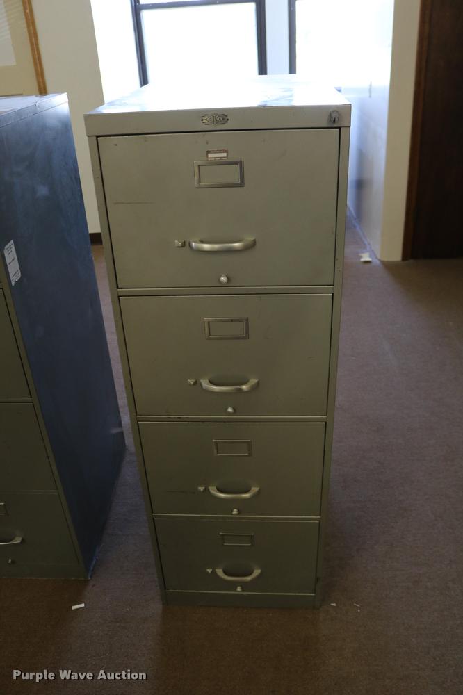 image for item DM9356 (2) four drawer filing cabinets