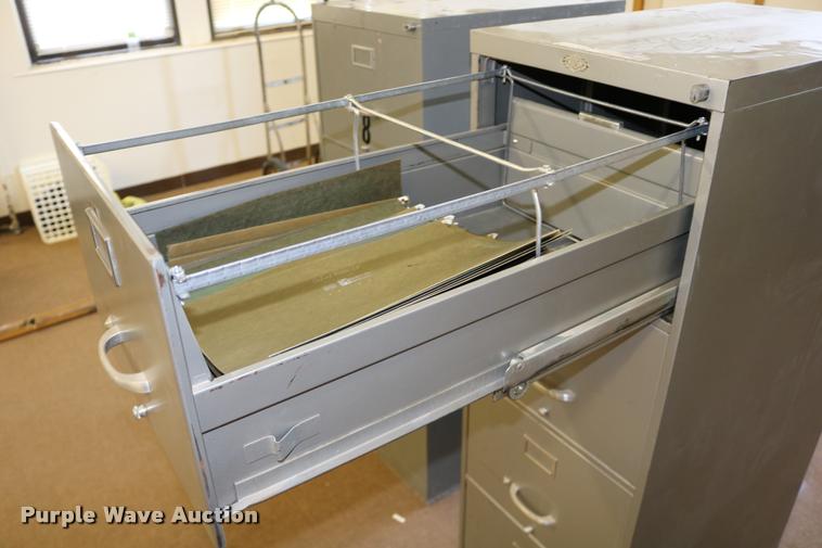 image for item DM9356 (2) four drawer filing cabinets