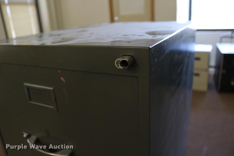 image for item DM9356 (2) four drawer filing cabinets