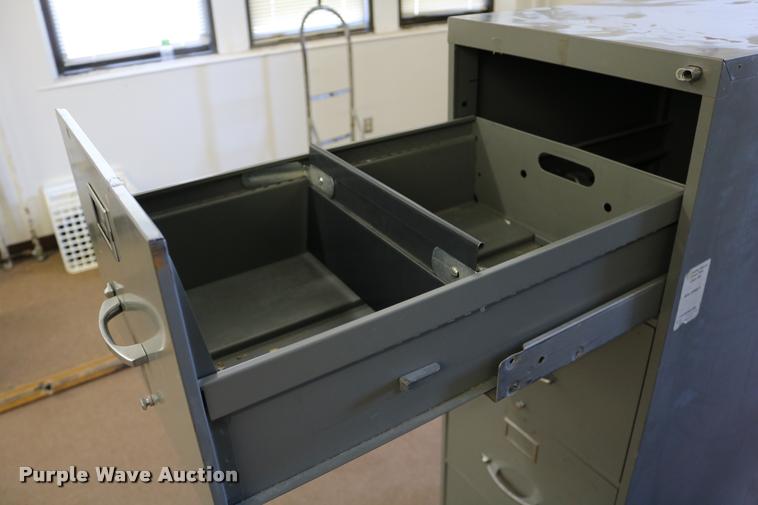 image for item DM9356 (2) four drawer filing cabinets