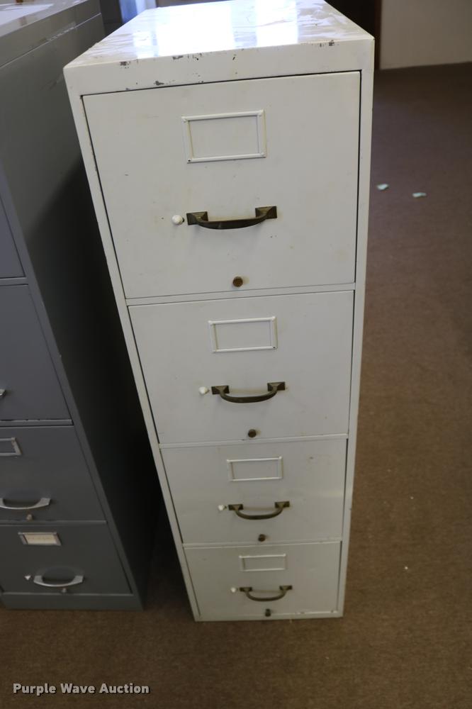 image for item DM9357 (5) four drawer filing cabinets
