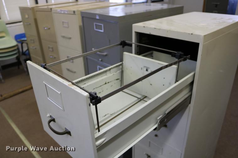 image for item DM9357 (5) four drawer filing cabinets