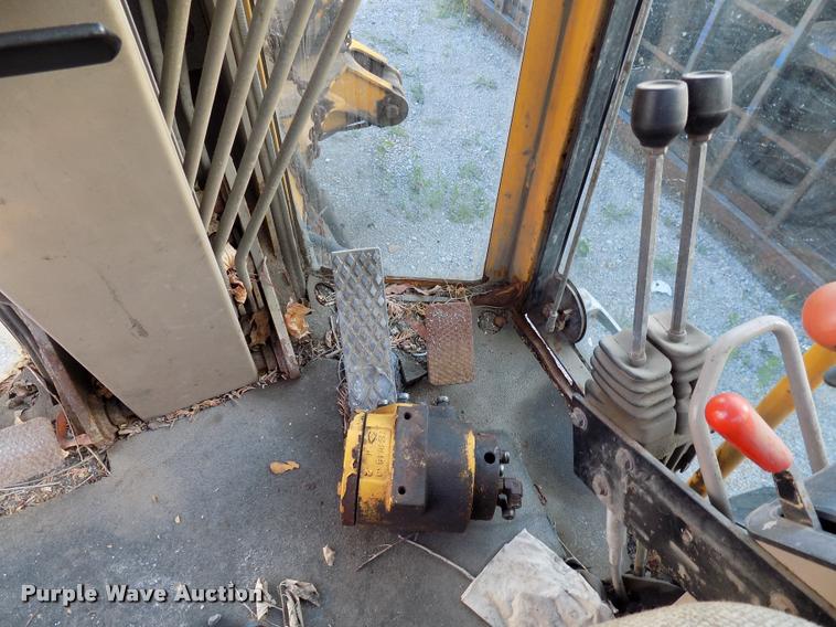 image for item DP9997 1999 John Deere 770CH  motor grader