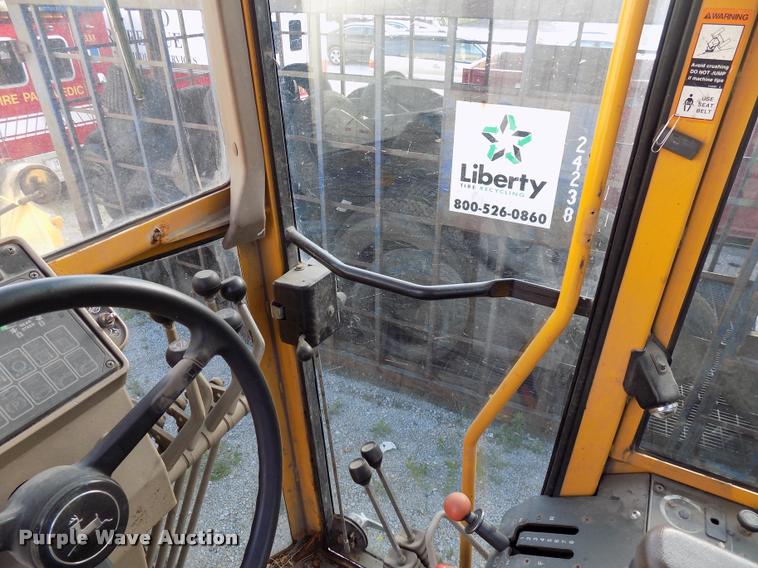 image for item DP9997 1999 John Deere 770CH  motor grader