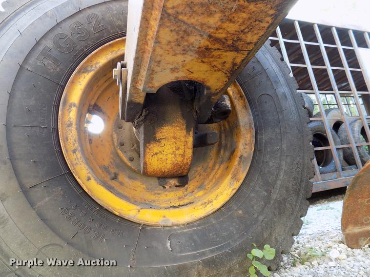 image for item DP9997 1999 John Deere 770CH  motor grader