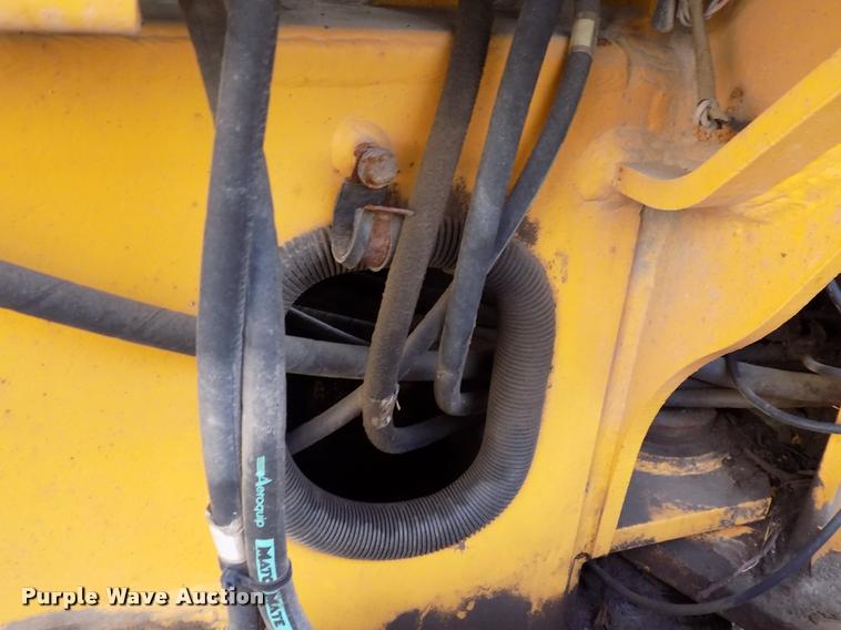 image for item DP9997 1999 John Deere 770CH  motor grader